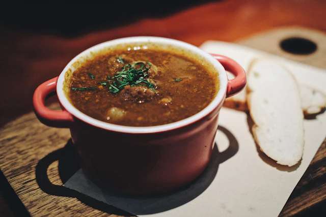 Ikarian lentil soup fakes soupa in rustic ceramic bowl